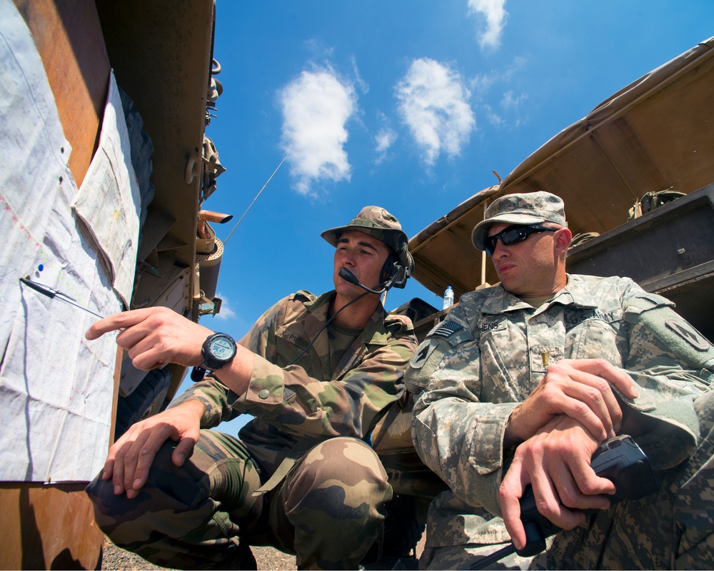 2/138th and French Mortarmen share best practices with 120mms