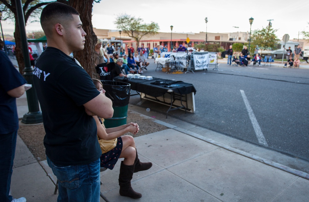 Marines volunteer as security detail at Mardi Gras on Main St.