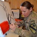 Artist continues to paint and inspire while deployed