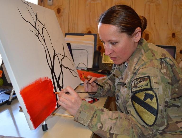Artist continues to paint and inspire while deployed
