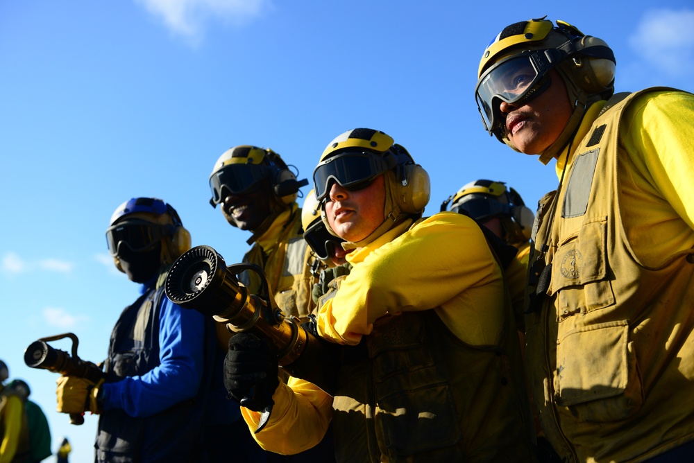 USS George HW Bush conducts training, carrier qualifications