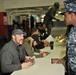 WWE wrestlers visit USS George H.W. Bush sailors