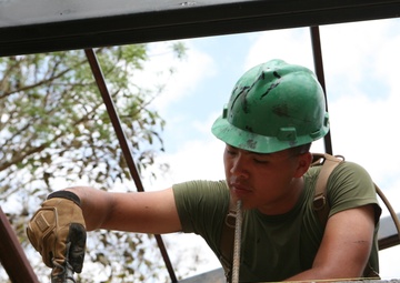 Marine’s journey puts smiles on faces of Thai children