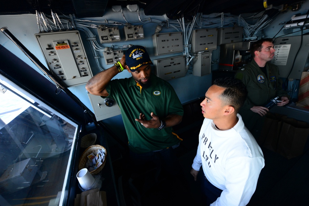 NFL players tour USS George H.W. Bush