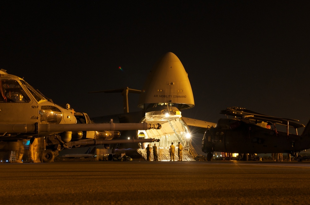 303rd Expeditionary Rescue Squadron arrives, unloads helos