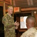 Chief Master Sgt Cody conducts all call brief in Kabul