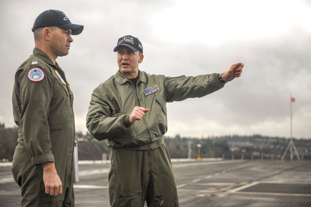 Officers training on flight deck procedures