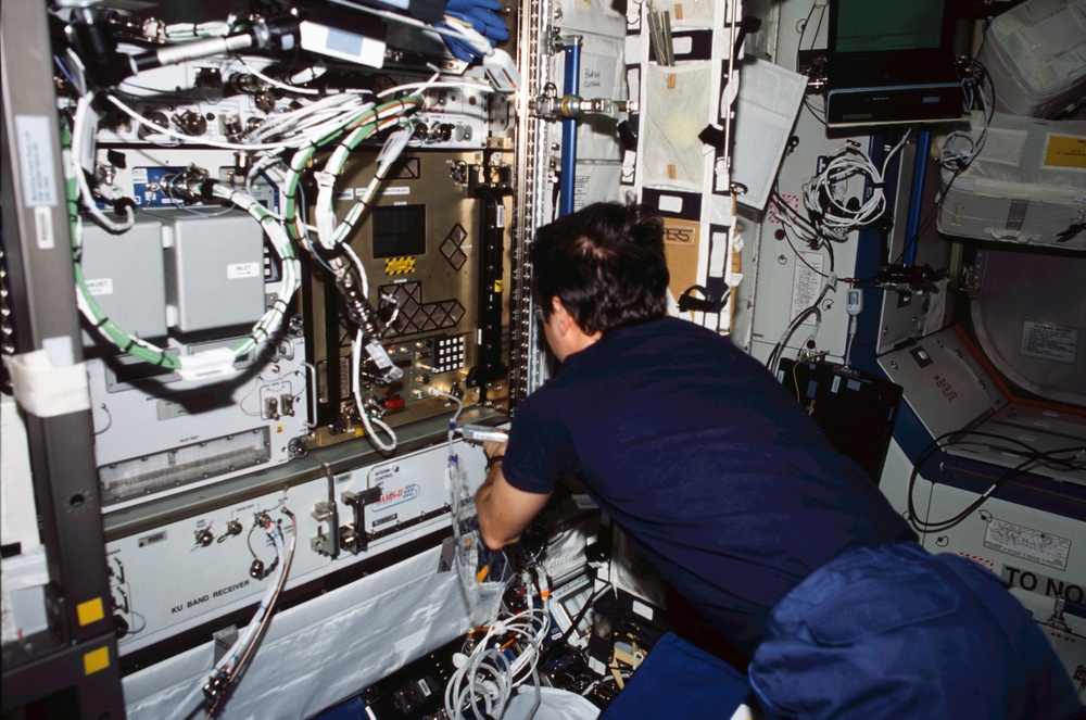 Bursch works at the BPS experiment in the U.S. Laboratory during Expedition Four