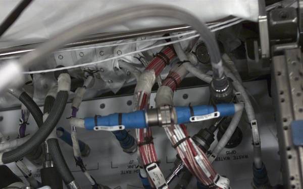 Blurred view of cables in the U.S. Laboratory taken during Expedition Three