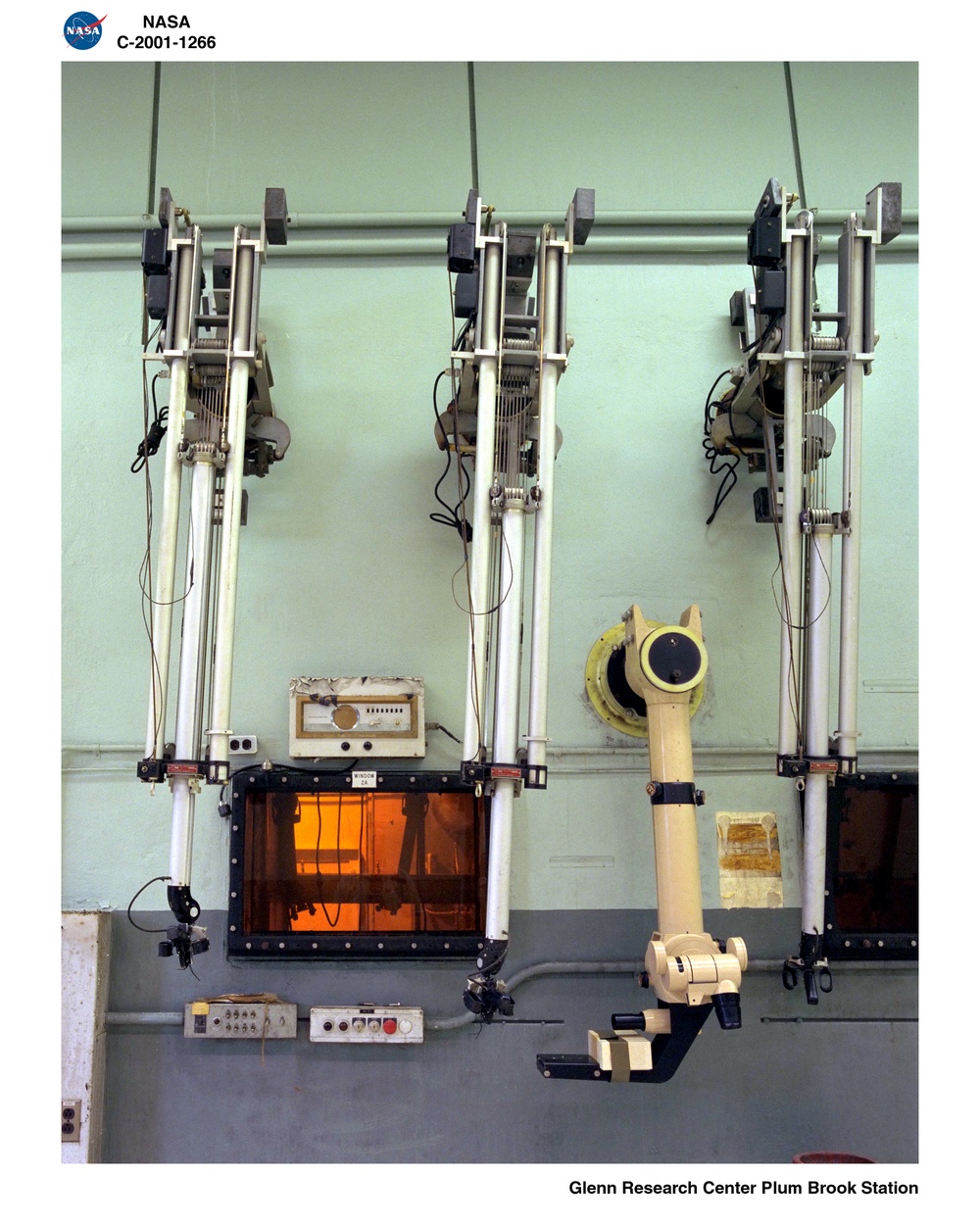 PLUM BROOK REACTOR FACILITY / MANIPULATOR ARM CONTROL ROOM WITH VIEW INTO HOT CELL / 4504 / N8 - L8