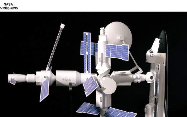 MODEL OF SPACE SHUTTLE WITH MIR SPACE STATION