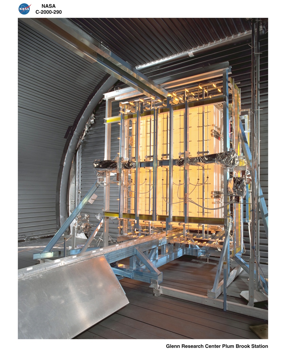 LOCKHEED MARTIN SPACE STATION RADIATOR PANELS FLIGHT HARDWARE STOWED WITH INFRARED HEAT LAMPS RUNNING AT NASA PLUM BROOK STATION SPACE POWER FACILITY SPF