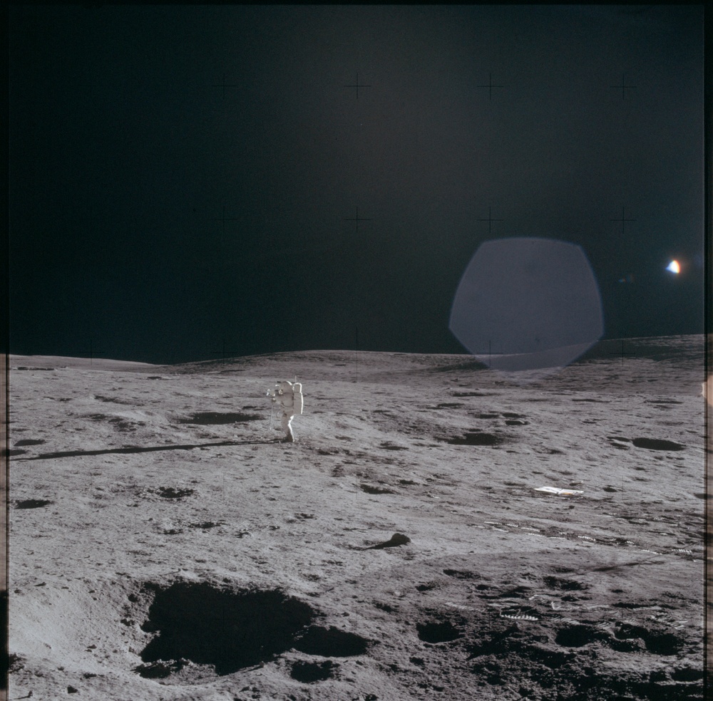 Apollo 14 Mission image - Northeast view of Astronaut Mitchell with a TV camera.