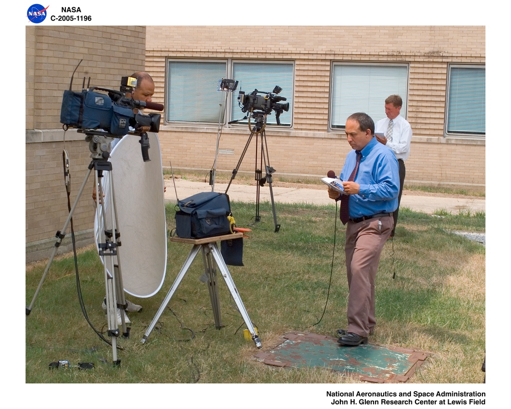 Cleveland News Television Reporters outside the Visitor Center for the STS-114 (Shuttle Transport System) Media Activity