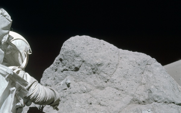 Apollo 17, Astonaut Harrison Schmitt works at Sample 7715, 7135 during EVA 3