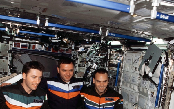 Soyuz 4 Crew group photo in the U.S. Laboratory taken during Expedition Four