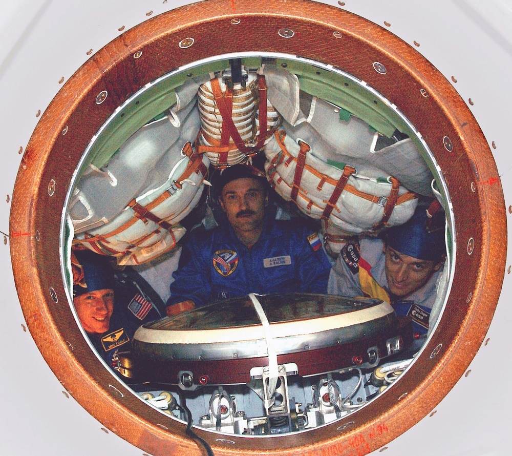 Expedition-8 Flight Members Pose Inside the Soyuz TMA-3 Vehicle