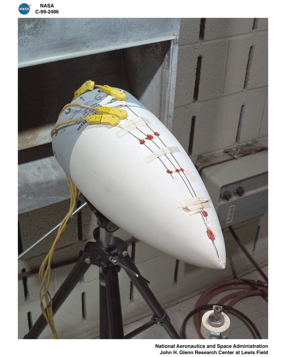 BURNER RIG TESTS IN BOTH HEATING AND COOLING POSITIONS - CERAMIC MISSILE RADOME TEST