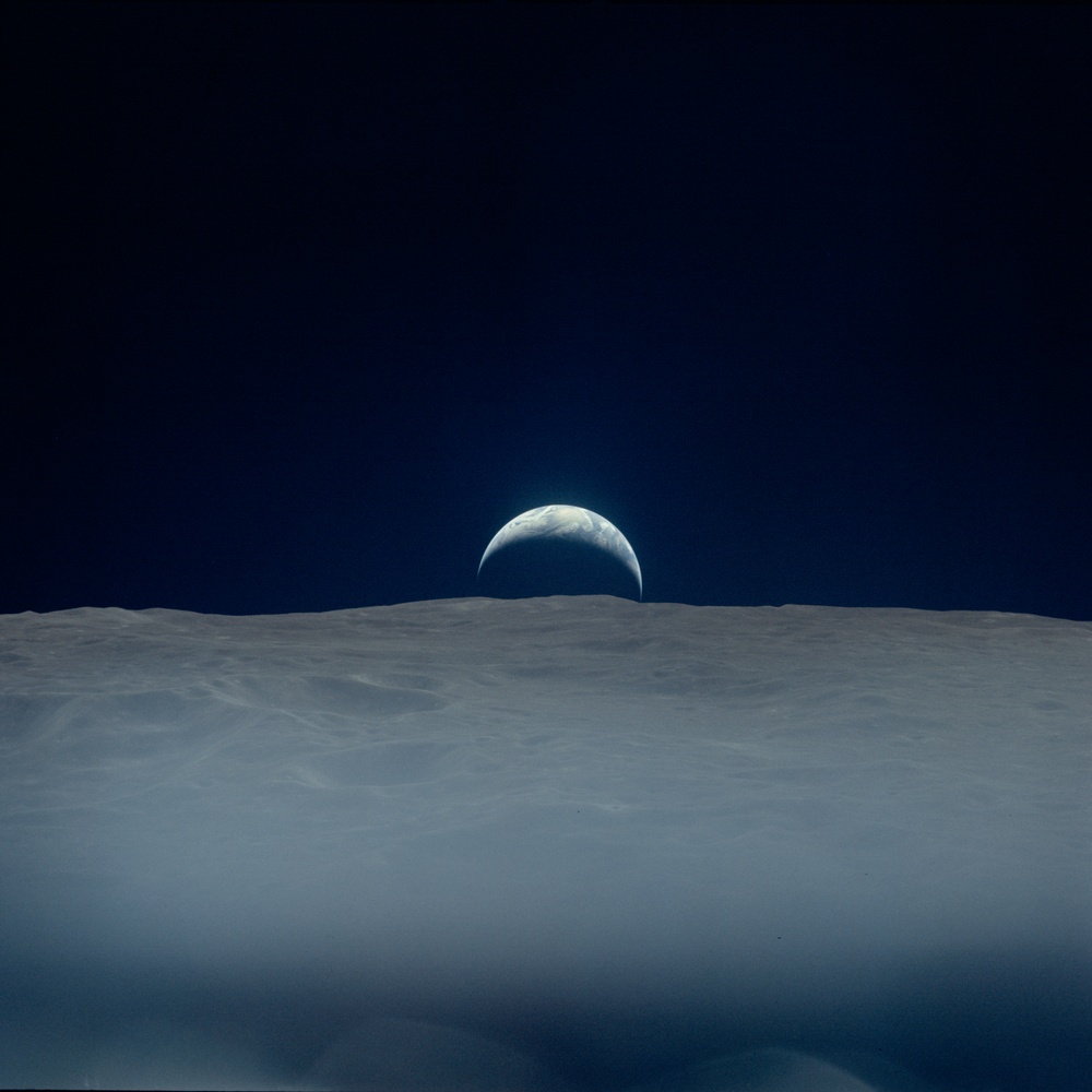 Apollo 12 Mission image  - View Earth rise just west of Crater Pasteur