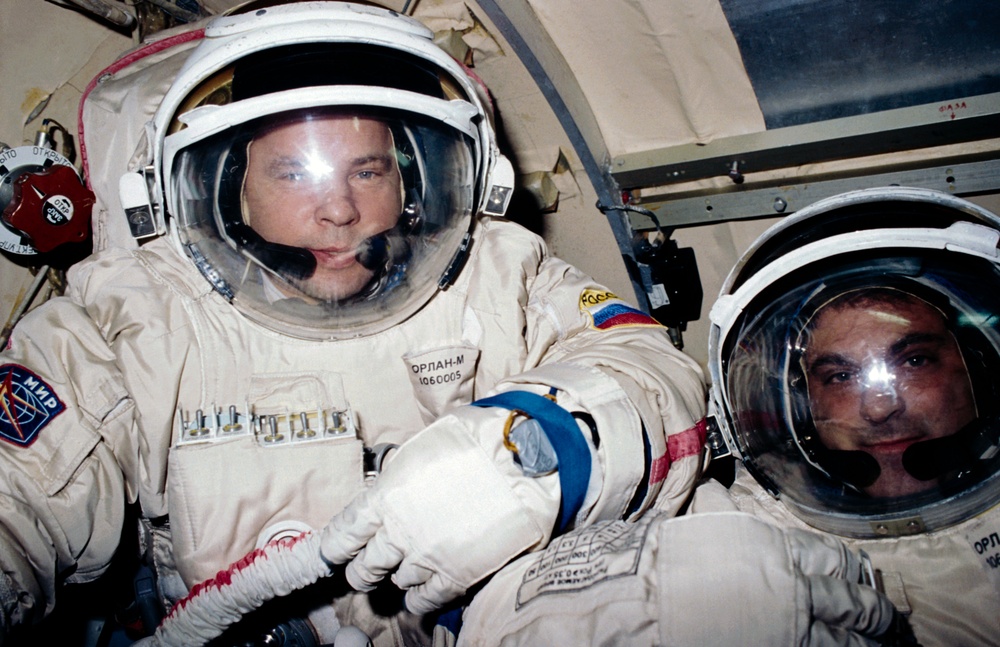 Solovyev and Wolf prepare for an EVA