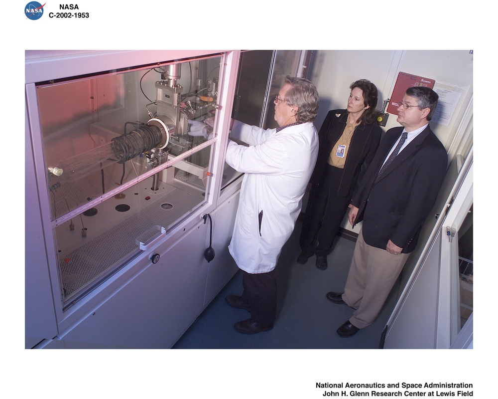 CINDY DREIBELBIS OBSERVES LOADING A GAAS EPIWAFER IN METALLO-ORGANIC CHEMICAL VAPOR DEPOSITION MACHINE AT SMALL BUSINESS INNOVATIVE RESEARCH  - SBIR - PARTNER - ESSENTIAL RESEARCH