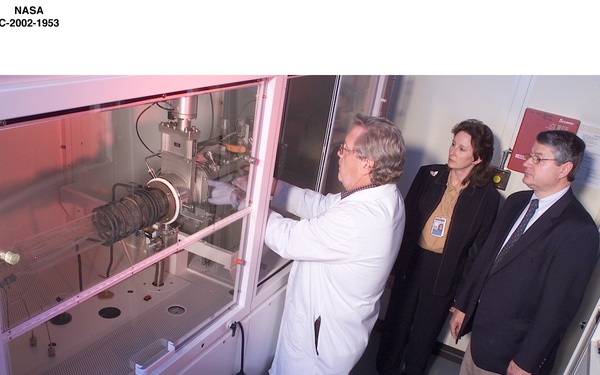 CINDY DREIBELBIS OBSERVES LOADING A GAAS EPIWAFER IN METALLO-ORGANIC CHEMICAL VAPOR DEPOSITION MACHINE AT SMALL BUSINESS INNOVATIVE RESEARCH  - SBIR - PARTNER - ESSENTIAL RESEARCH