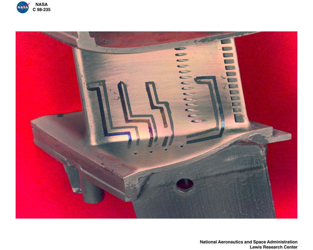 HEAT TRANSFER EXPERIMENT WITH SOLAR TURBINE BLADE AND THIN FILM THERMOCOUPLES