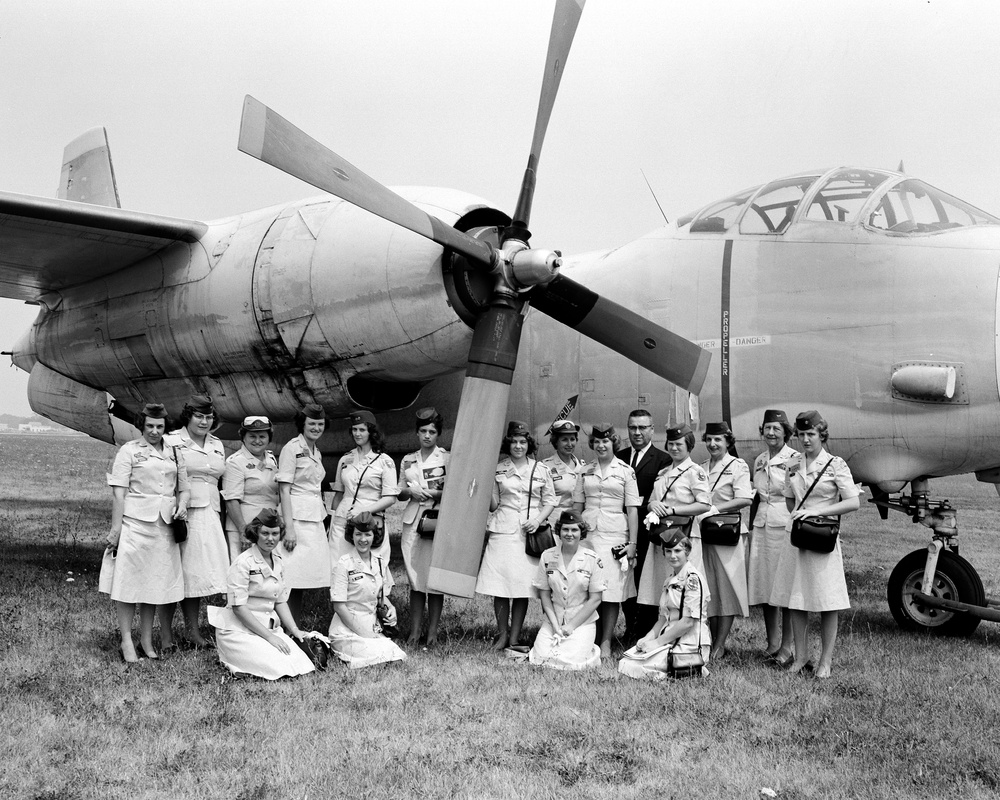 CIVIL AIR PATROL GIRLS FROM MONTANA AND UTAH SHOWN WITH AJ-2 AIRPLANE AND MILTON LIPES TOUR GUIDE