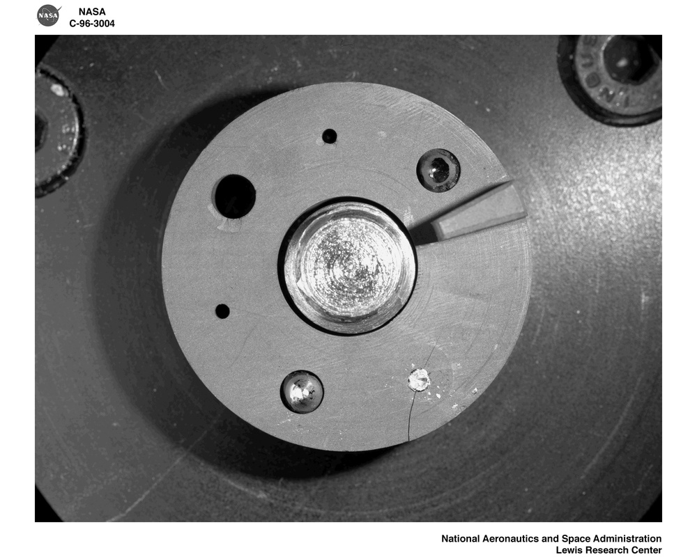 SAMPLE CELL GERMANIUM OVERFLOW OF THE DIFFUSION PROCESS IN MOLTEN SEMICONDUCTOR FLIGHT EXPERIMENT DPIMS