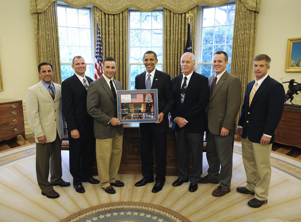 STS-119 Crew Presents Montage to President Obama