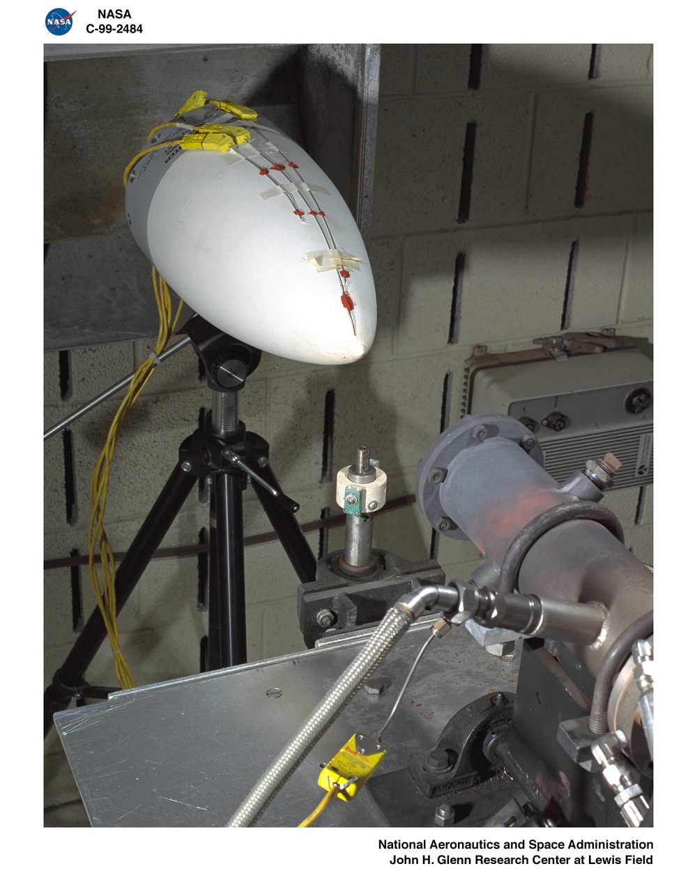 BURNER RIG TESTS IN BOTH HEATING AND COOLING POSITIONS - CERAMIC MISSILE RADOME TEST