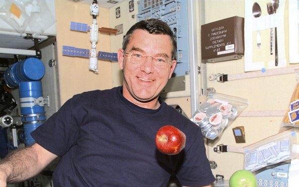 Voss in Service Module with apples