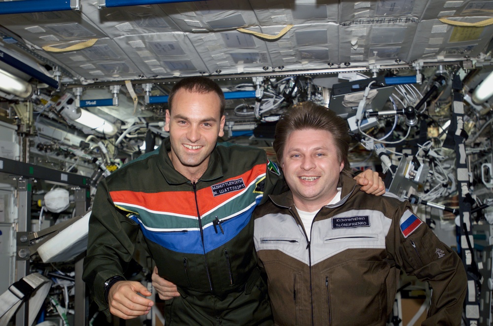 Shuttleworth and Onufrienko pose for a photo in U.S. Lab during Expedition Four