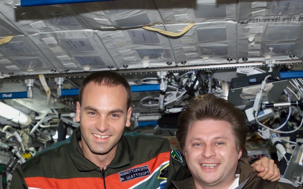 Shuttleworth and Onufrienko pose for a photo in U.S. Lab during Expedition Four