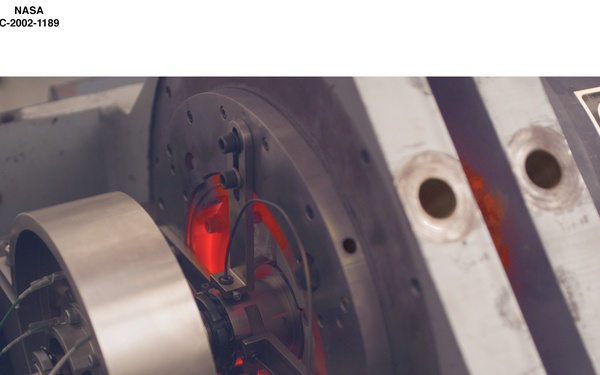 HIGH TEMPERATURE MAGNETIC BEARING TEST RIG AT 1000 DEGREES FARENHEIDT