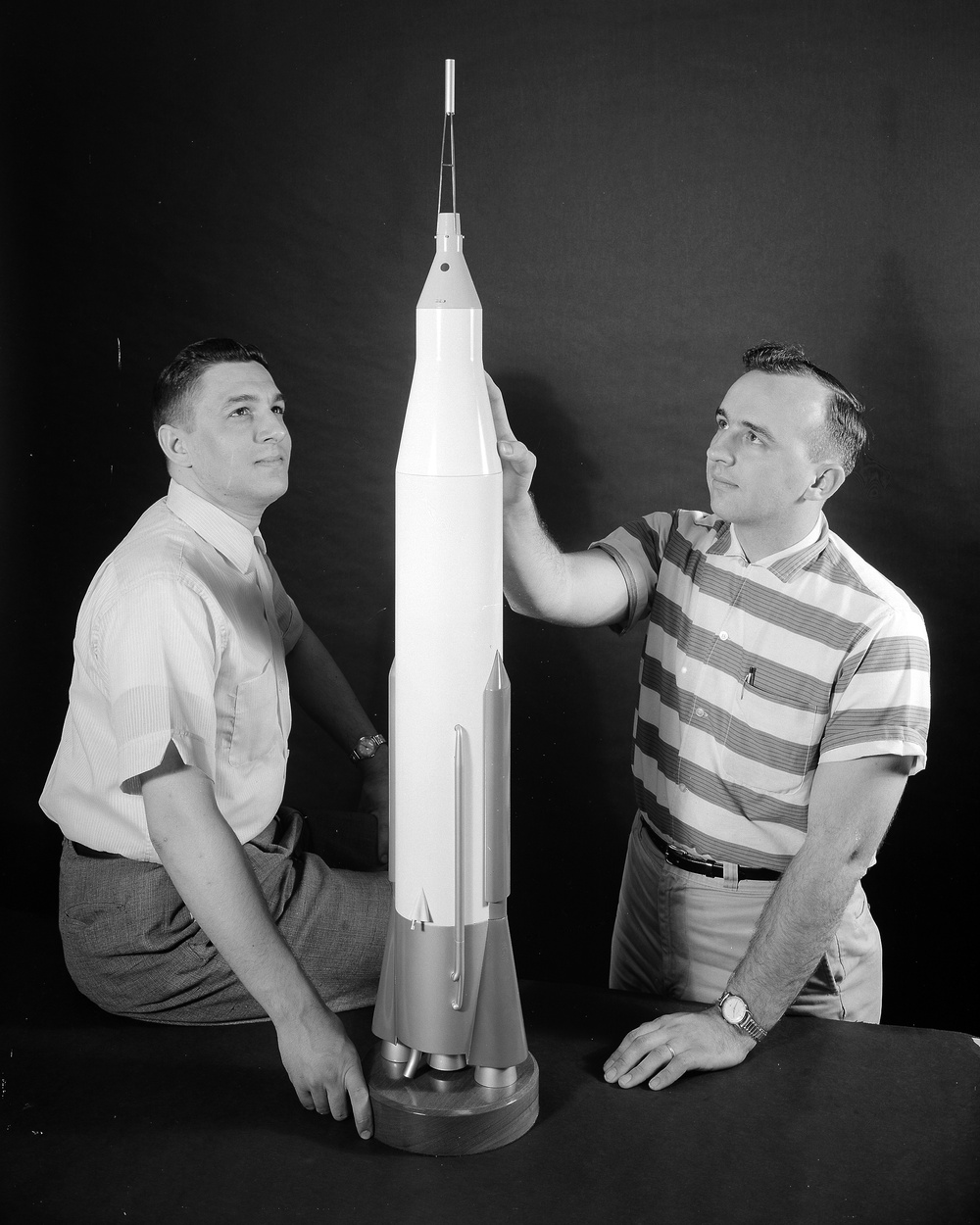 CHARLES HECKELMOSER AND DON WILFERT WITH AN ATLAS ROCKET MODEL