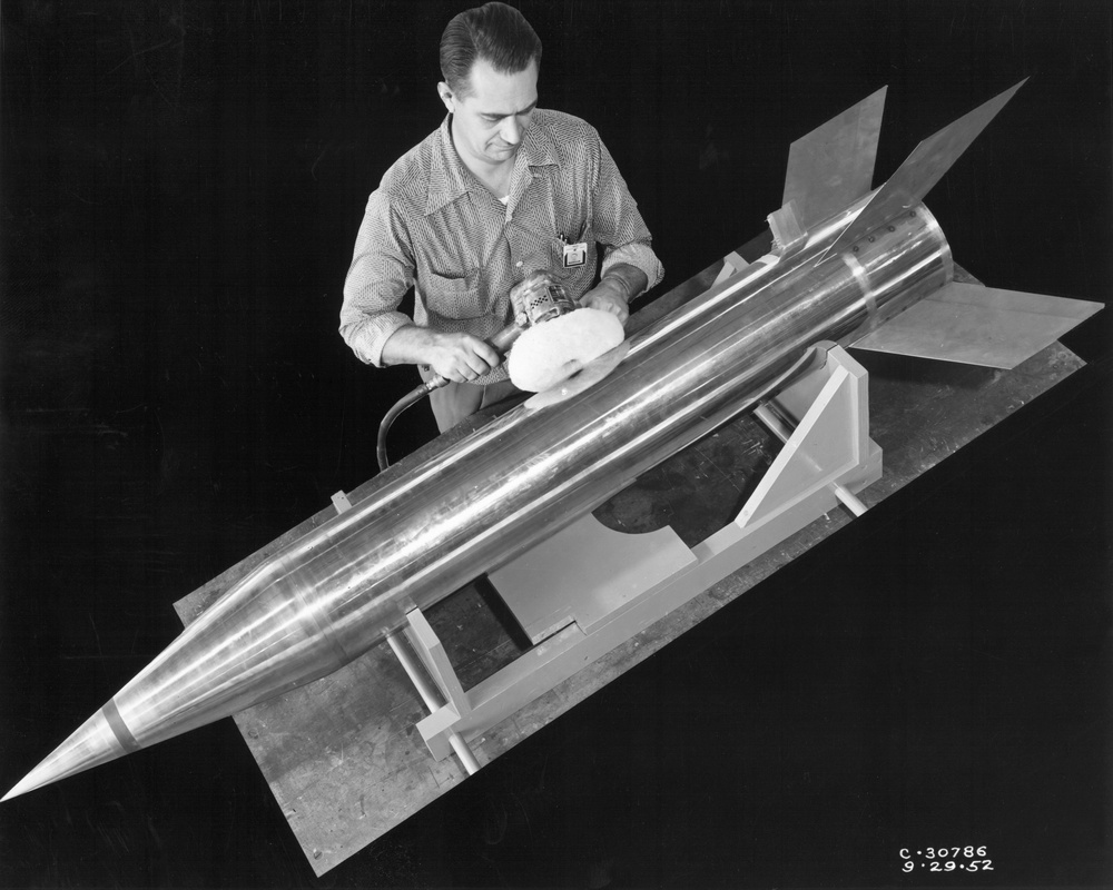 BUFFING FINISH ON THIOKOL ROCKET MISSILE