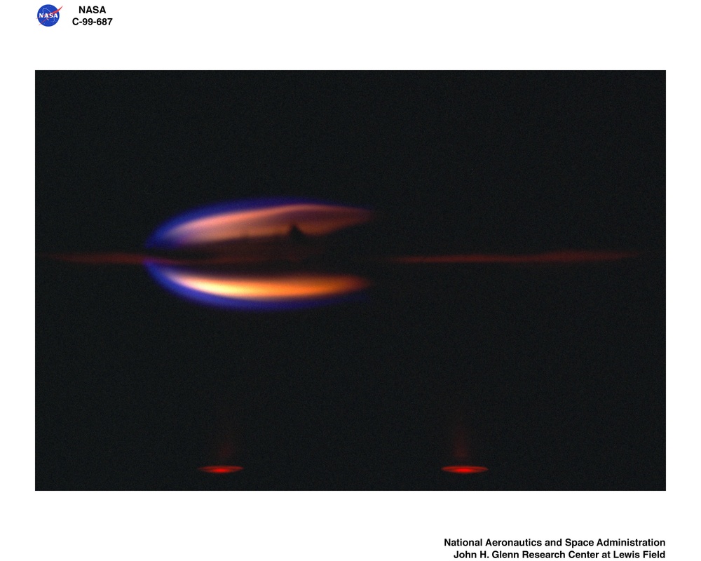 TRANSITION FROM IGNITION TO FLAME GROWTH UNDER EXTERNAL RADIATION IN THREE DIMENSIONS TIGER-3D TEST RESULTS FROM THE JAPAN MICROGRAVITY CENTER JAMIC