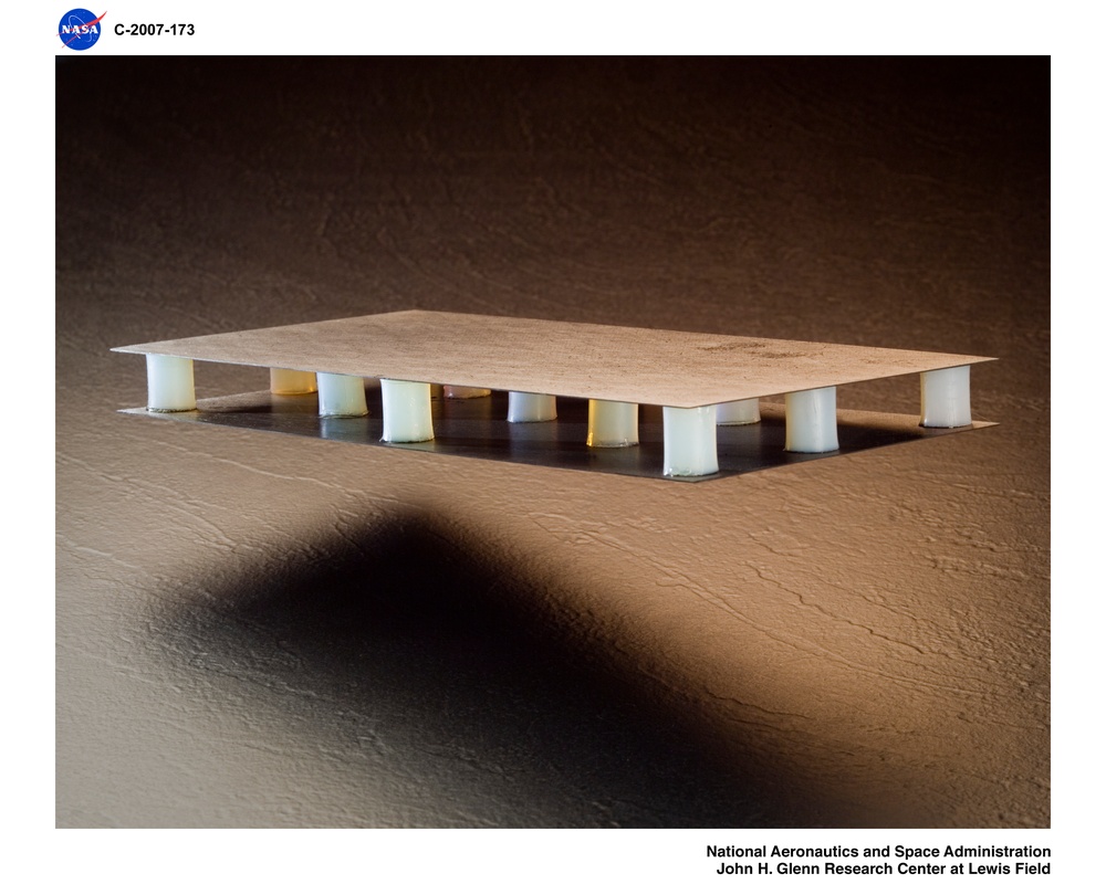 16mm diameter Aerogel posts sandwiched between  0.5mm thick PMR-15, Polymer Matrix Composite panels