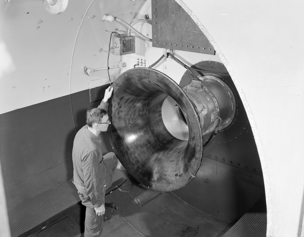 COMBUSTOR AND BELLMOUTH INSTALLED ON J-65 ENGINE IN TANK