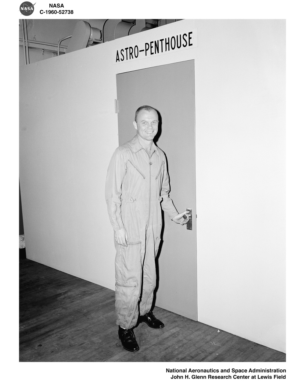 PROJECT MERCURY - ASTRONAUT JOHN H GLENN JUNIOR TESTING THE GIMBALING RIG IN THE ALTITUDE WIND TUNNEL AWT AT NASA LEWIS RESEARCH CENTER