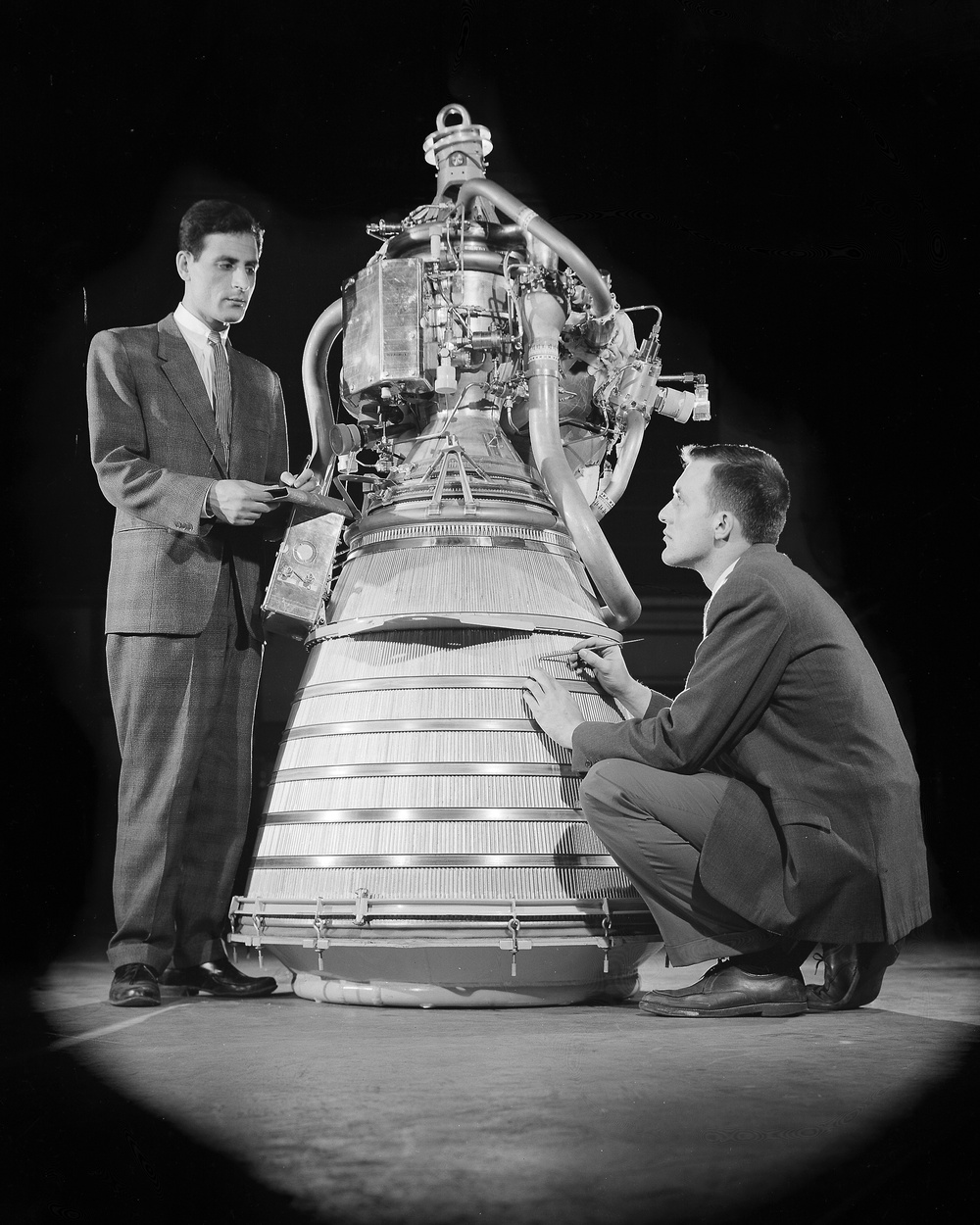 ALI MANSOUR AND NED HANNUM WITH CENTAUR ENGINE