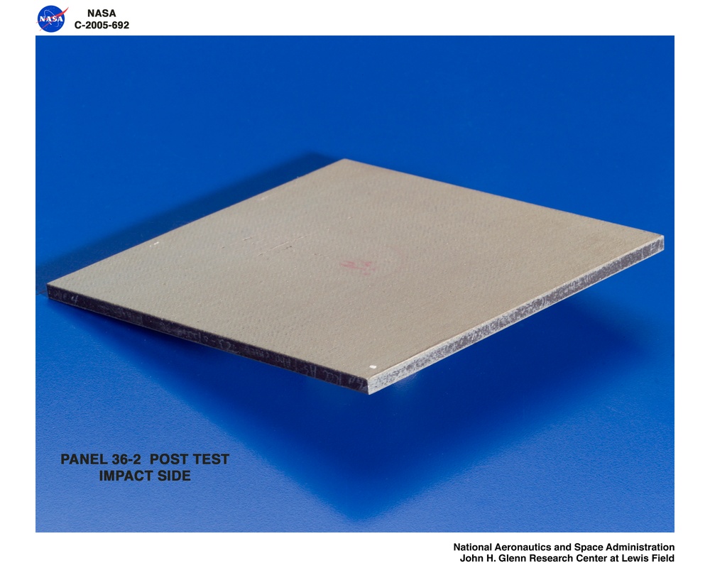 Panel 36-2 post test  RCC carbon / carbon fiber panels - the panels are space shuttle tile material being tested in the ballistics lab building 49