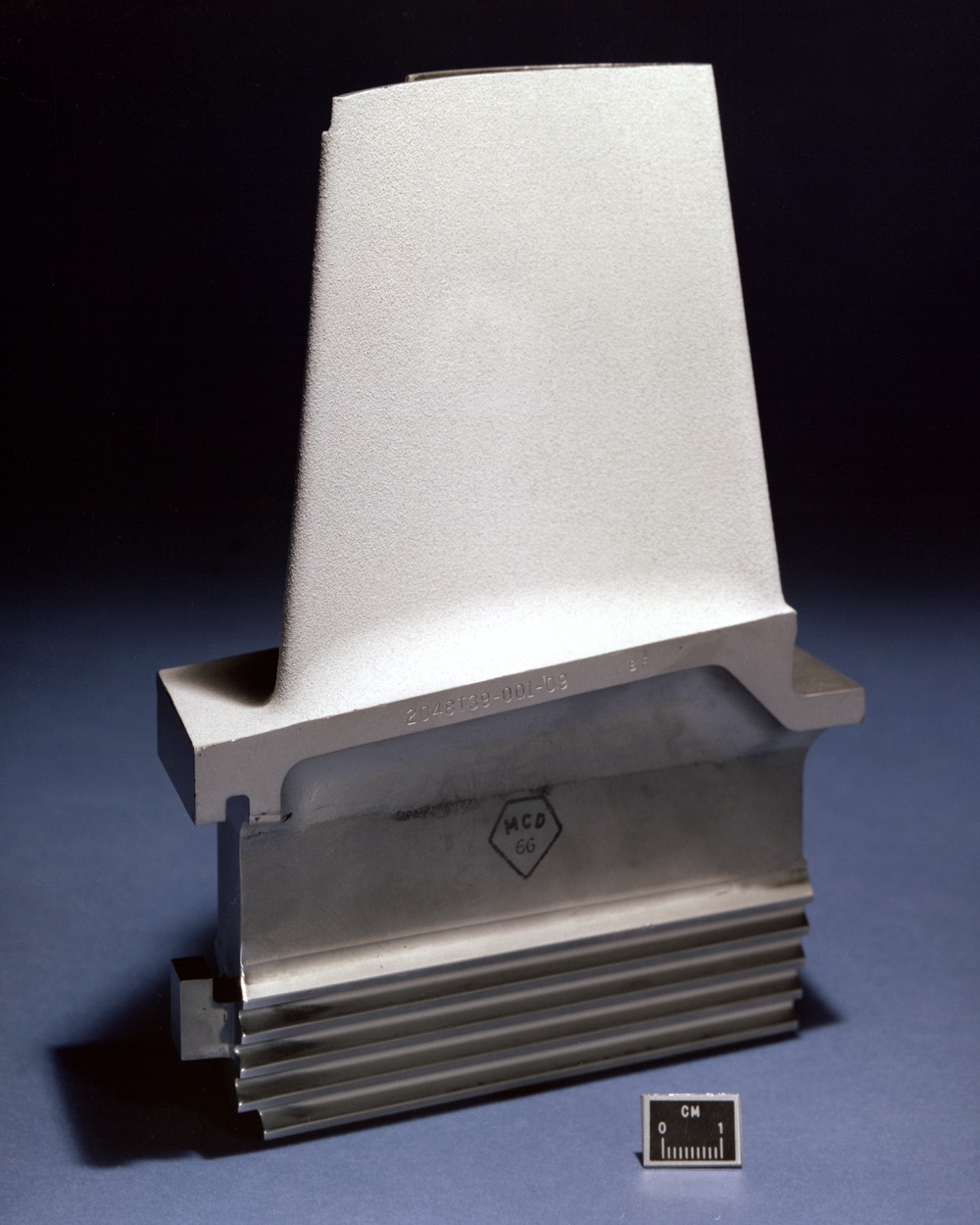 BURNER RIG SHOWING SPECIMENS ROTATING AND NOT ROTATING - UTILITY TURBINE BLADE WITH THERMAL BARRIER COATING - J BROWN COATING UTILITY TURBINE BLADE AND HOLLOW EROSION SPECIMEN