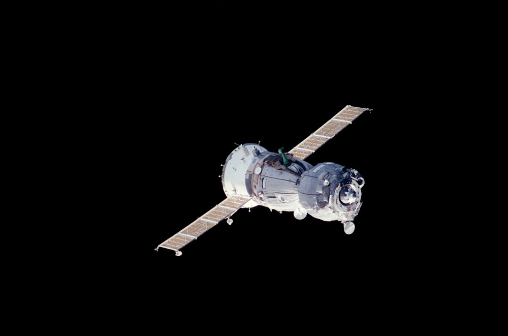 View of a Soyuz spacecraft approaching the ISS during Expedition Three