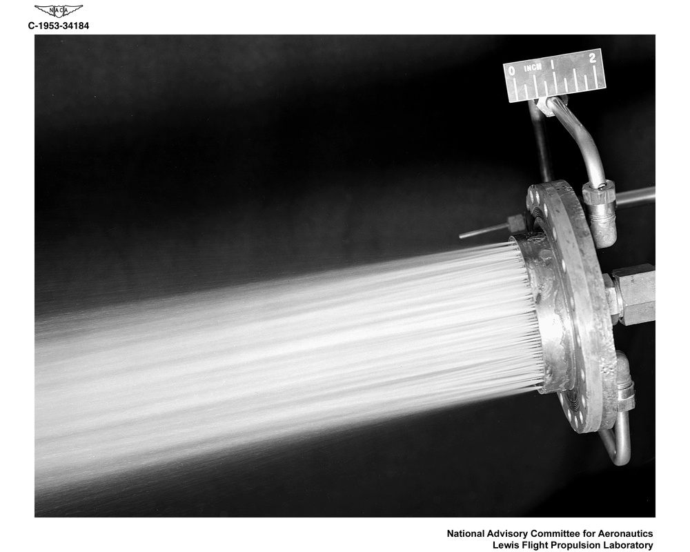 WATER SPRAY PATTERN FROM 1000 POUND THRUST FLUORINE AMMONIA LIKE ON LIKE INJECTOR