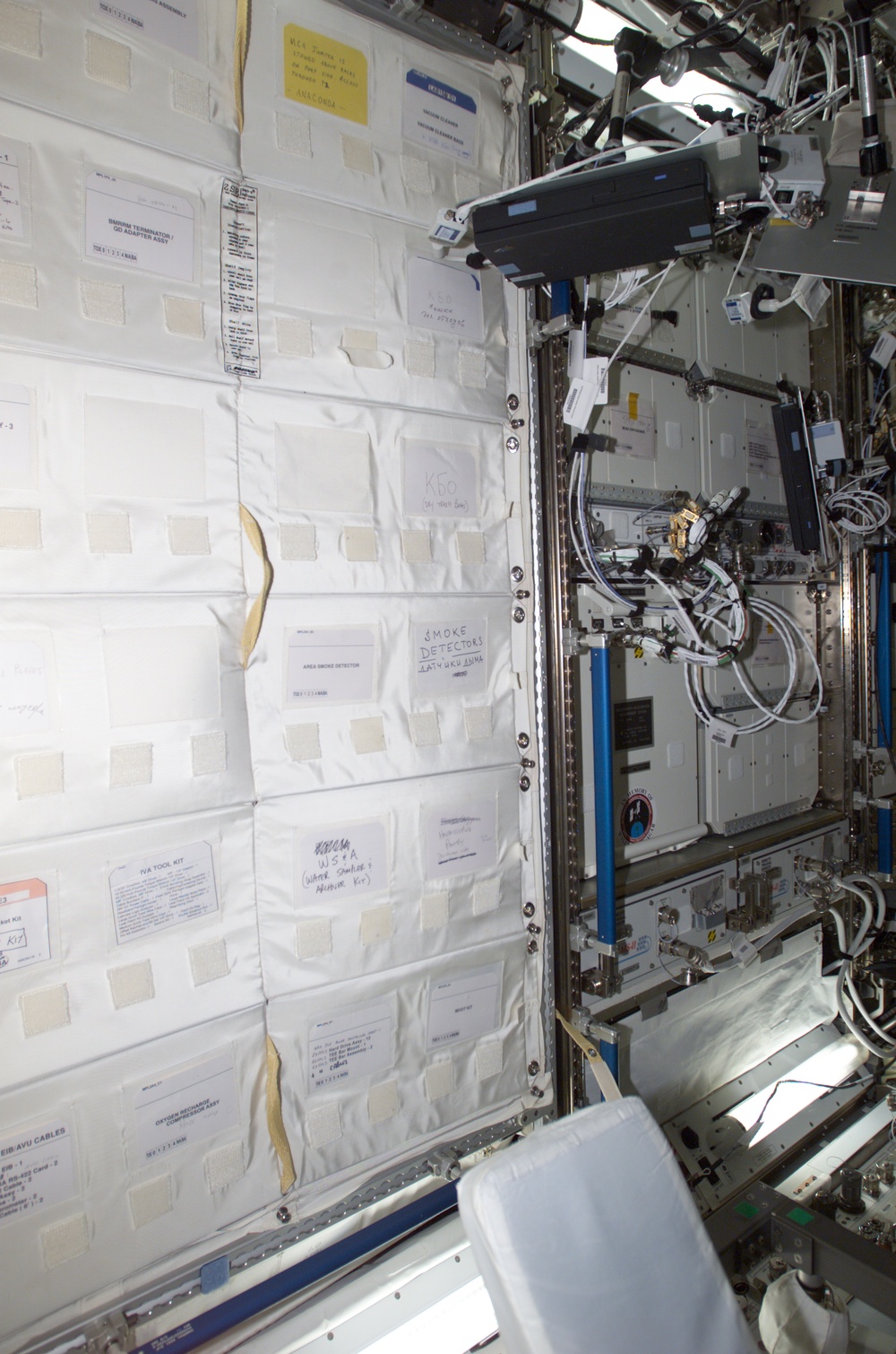 EXPRESS Rack 1 and stowage rack in U.S. Laboratory, Expedition Four