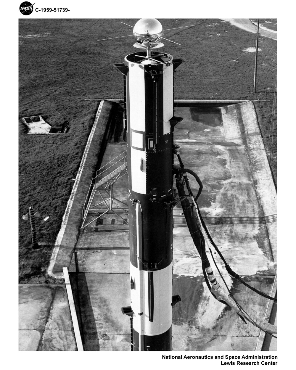 PROJECT MERCURY - PUBLICITY PHOTOGRAPHS OF MISSILE AND 7 ASTRONAUTS - VANGUARD I SPACECRAFT BEFORE PLACEMENT OF NOSE CONE