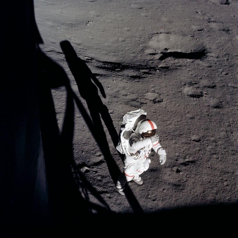 Apollo 14 Mission image - Astronaut Alan B. Shepard,Jr., commander, holds his right glove over his helmet visor as if to shade his eyes from the brilliant Sun.