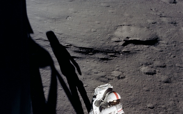 Apollo 14 Mission image - Astronaut Alan B. Shepard,Jr., commander, holds his right glove over his helmet visor as if to shade his eyes from the brilliant Sun.